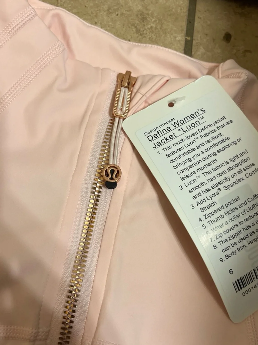 lululemon athletica Women's Pink Full-Zip Jumpsuit with rose gold zipper.